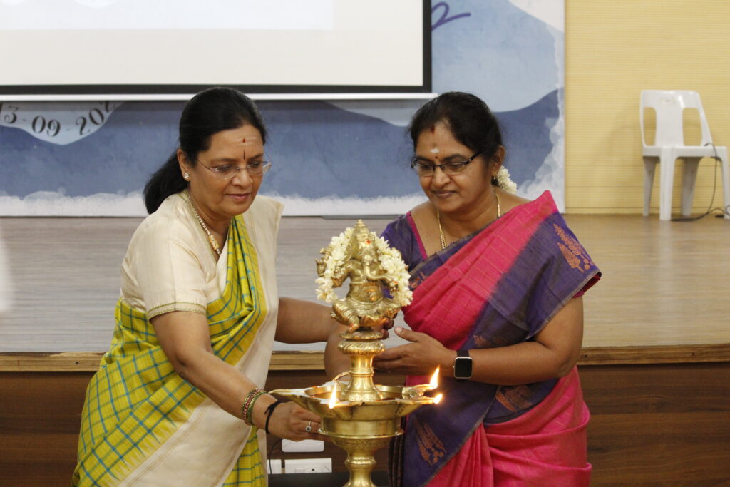 Vasuki Ma'am & Principal lighting the lamp